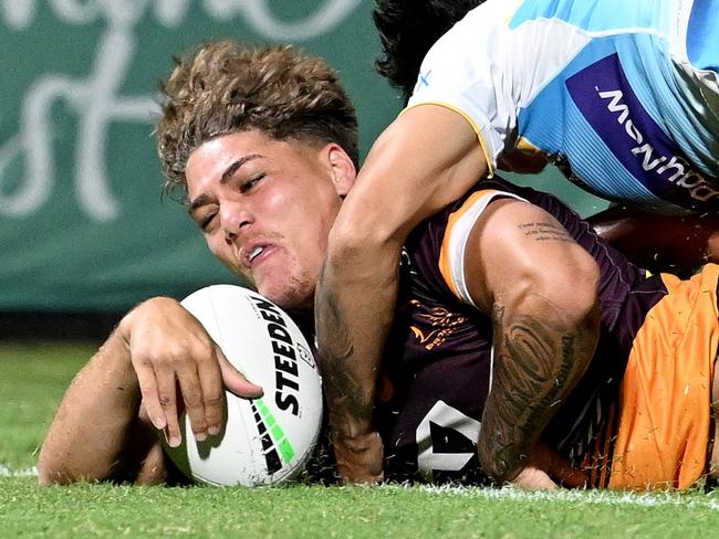 SUNSHINE COAST, AUSTRALIA - FEBRUARY 12: Reece Walsh of the Broncos scores a try during the NRL Trial Match between the Brisbane Broncos and Gold Coast Titans at Sunshine Coast Stadium on February 12, 2023 in Sunshine Coast, Australia. (Photo by Bradley Kanaris/Getty Images)