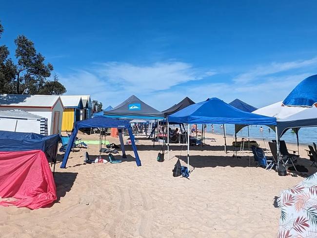 There is outrage over beachgoers 'reserving' spots on the narrow strip of sand early in the morning, stopping those who arrive later from getting a spot. Picture: Facebook