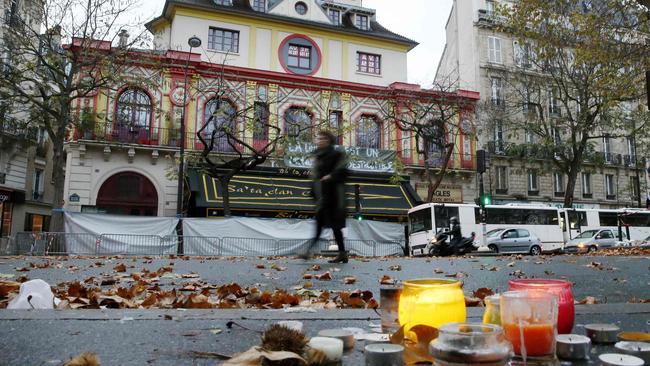 A woman walks past the Bataclan Theatre in Paris where at least 82 people were killed during terror attacks co-ordinated attacks in which at least 129 people lost their lives in Paris last year. <i>Photo: AFP </i>