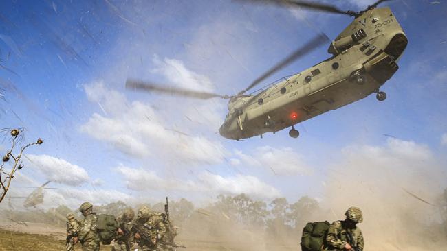 Alaskan based paratroopers from US Army's 3rd Battalion, 509th Infantry Regiment, 4th Brigade Combat Team (Airborne), 25th Infantry Division, are dropped at the Townsville Field Training Area, by an Australian Army CH-47 Chinook, during Exercise Talisman Sabre 2021.