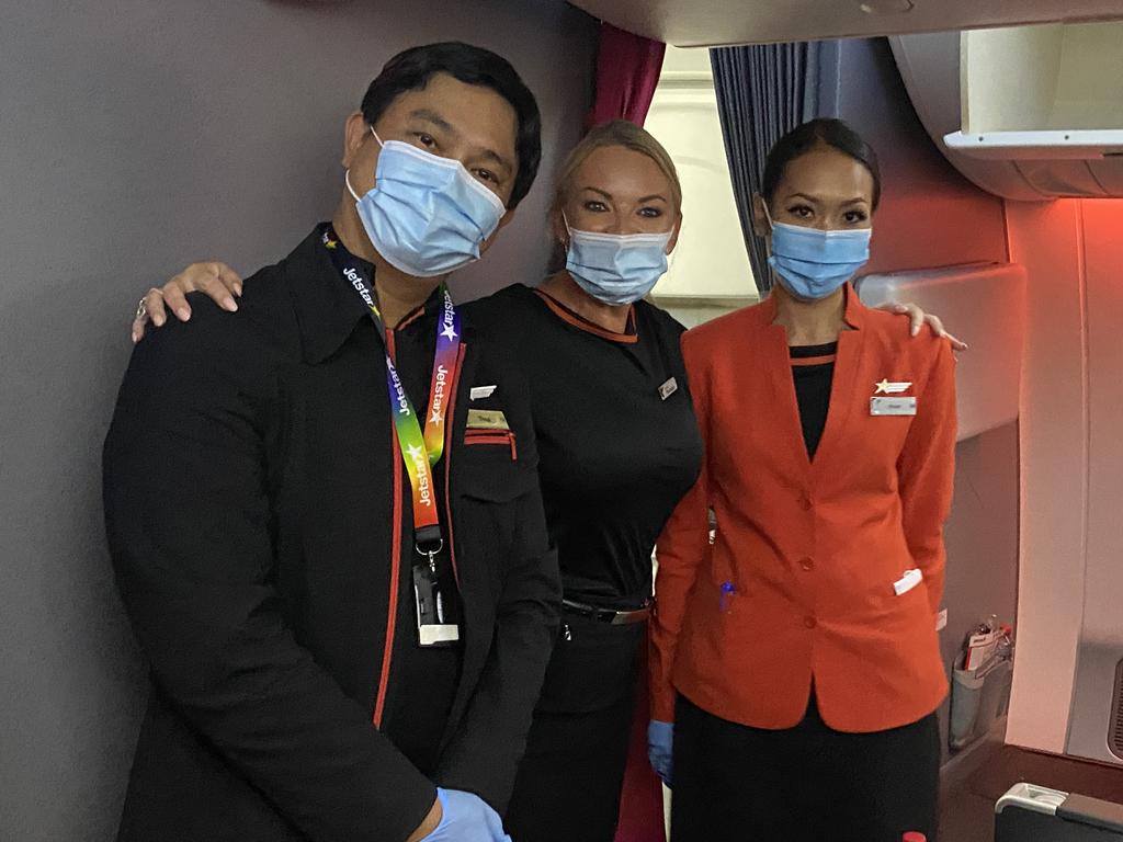 Cabin manager Catherine Barker (centre) with her fellow Jetstar flight attendants. Picture: news.com.au