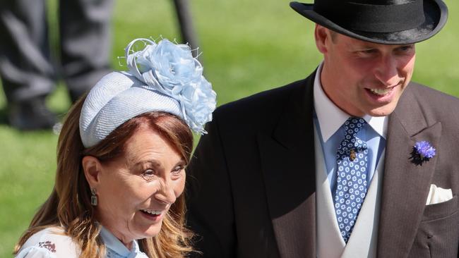 ASCOT, ENGLAND - JUNE 19: Carole Middleton holds hands with Prince William, Prince of Wales as they attend day two of Royal Ascot 2024 at Ascot Racecourse on June 19, 2024 in Ascot, England. (Photo by Chris Jackson/Getty Images)