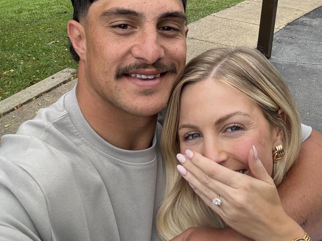 Brisbane Broncos star Kotoni Staggs and his fiancee Brittany Becht show off the ring after their engagement. Picture: Supplied/Kotoni Staggs