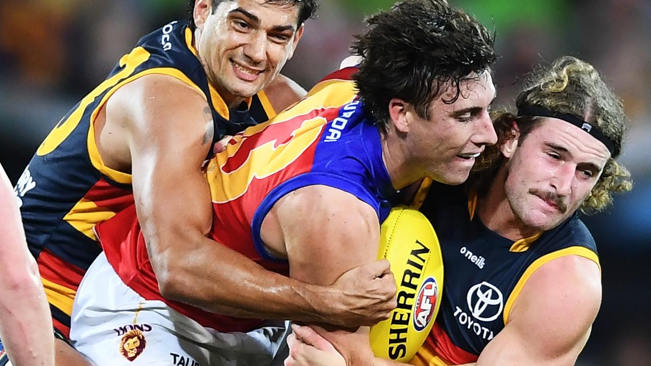 Sam Berry and Shane McAdam (left) tackle Noah Answerth. Picture: Mark Brake/Getty Images