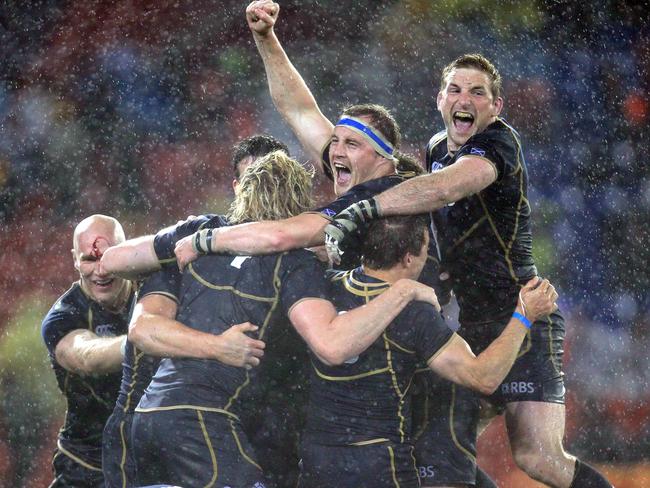 Scottish players celebrate their famous victory in Newcastle.