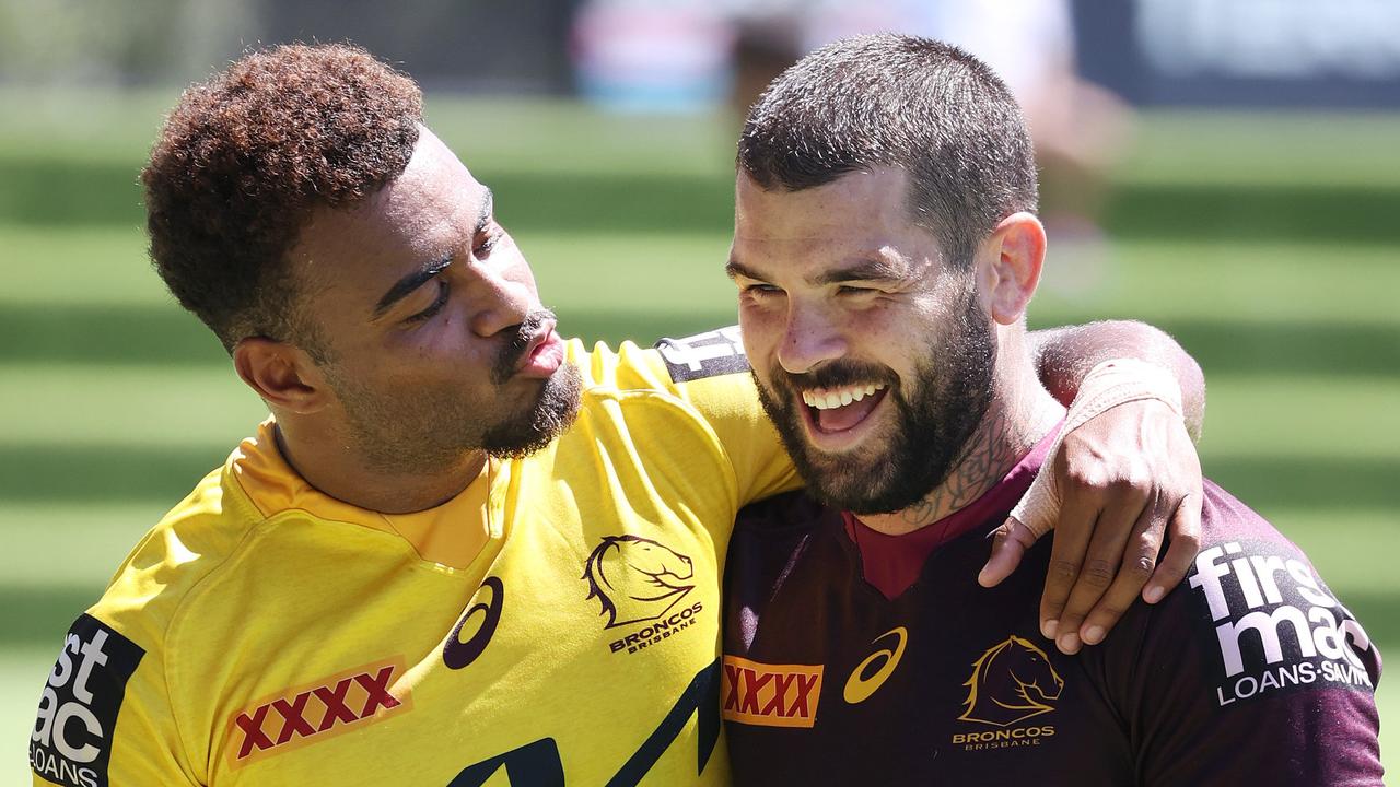 Ezra Mam showing some love for Adam Reynolds, Brisbane Broncos training, Red Hill. Picture: Liam Kidston