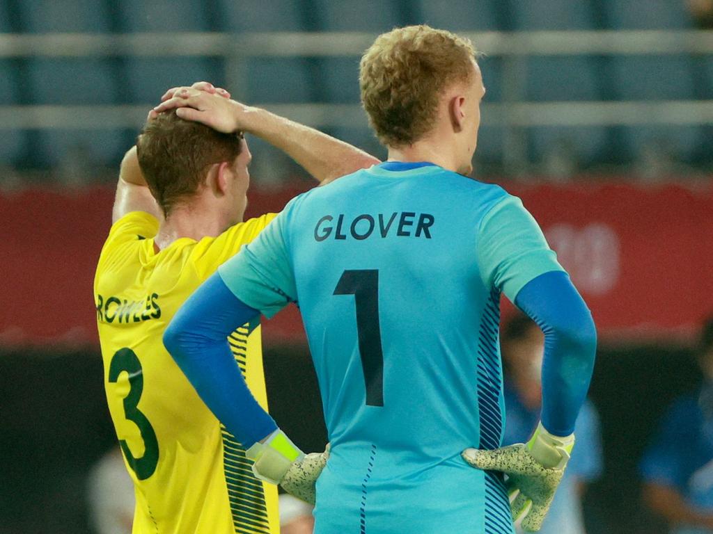 Australia's defender Kye Rowles and Australia's goalkeeper Thomas Glover react after the end of their campaign.