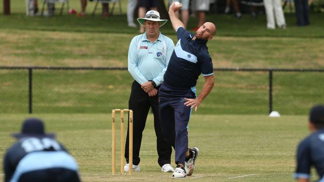 John Hastings bowling for Kew. Picture: Stuart Milligan