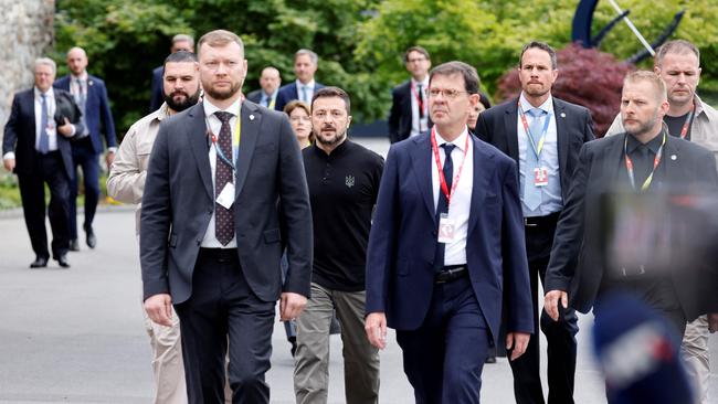 Volodymyr Zelensky, centre, arrives at the Burgenstock resort. Picture: AFP