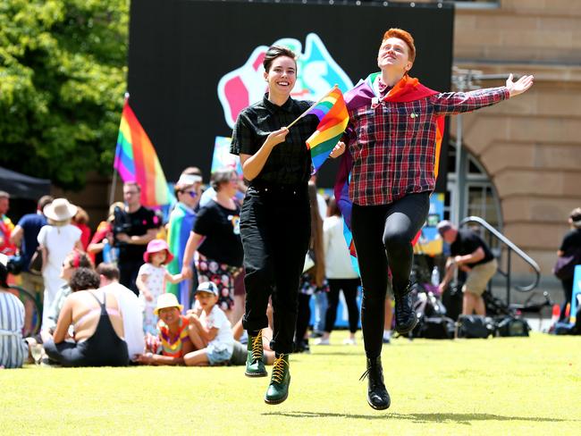 Dom Cawood and Eloise Kelk celebrate after the same sex marriage vote result announcement in Queens Park, Brisbane Australia, November 15, 2017.Picture: AAP Image/David Clark