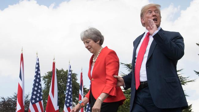 Theresa May and Donald Trump during his visit to Britain last year. Picture: Getty Images