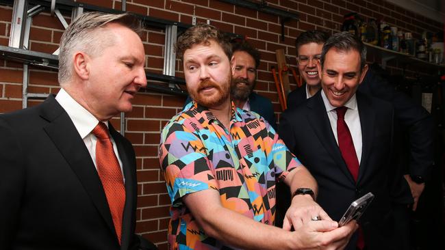 Local resident of Dundas, Matthew Holobrodskyj has a visit from Chris Bowen and Jim Chalmers to show them his energy saving Tesla battery.