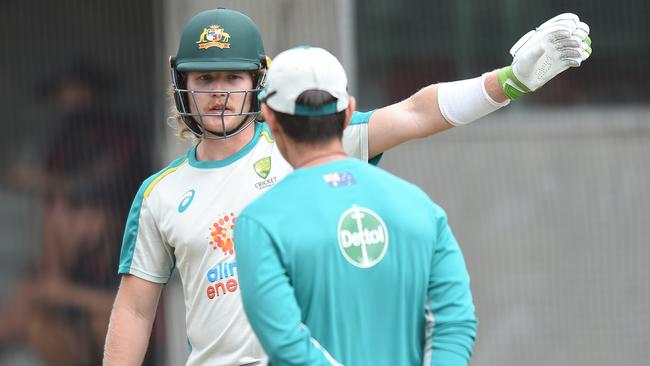 Will Pucovski talks to coach Justin Langer at an Australian team training session at the MCG Picture: Josie Hayden