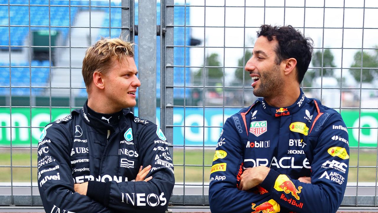 Daniel Ricciardo with Mick Schumacher at testing on the Silverstone track. Photo by Mark Thompson/Getty Images.