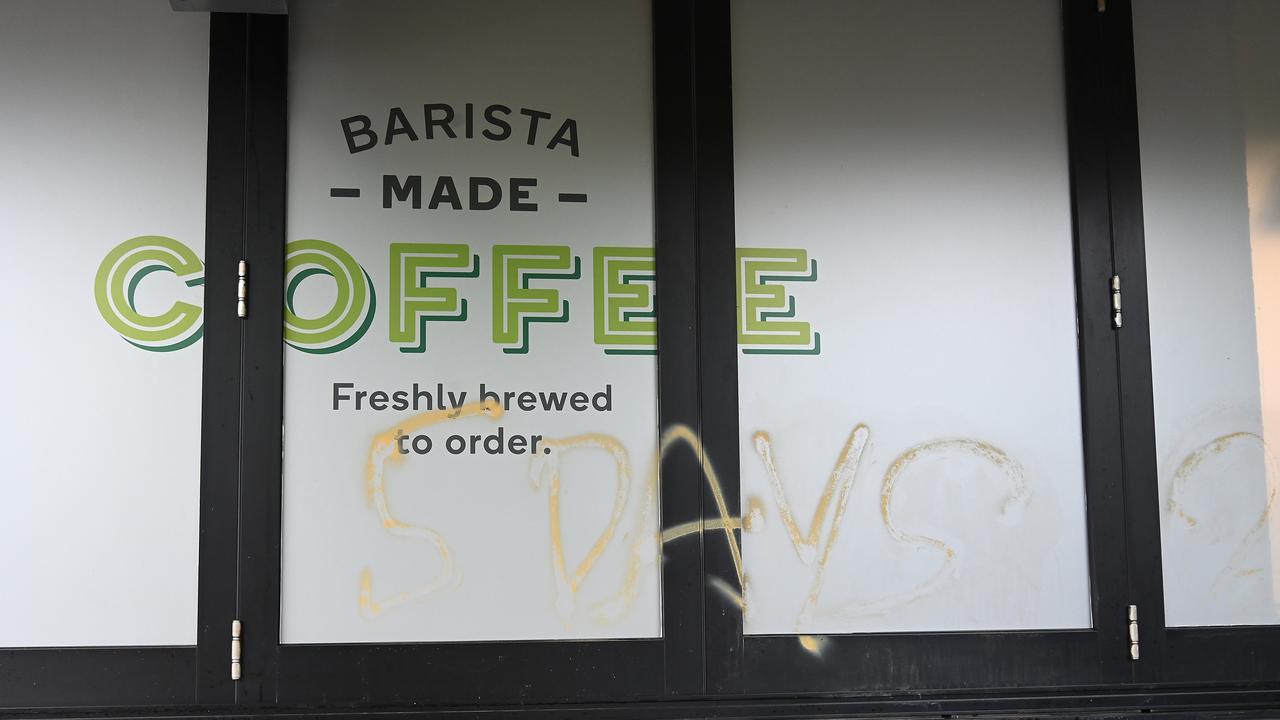 Damage outside of the Teneriffe Woolworths Metro. Picture: NCA NewsWire / John Gass