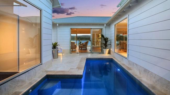 This incredible waterfront home at East Gosford was snapped up by local family.