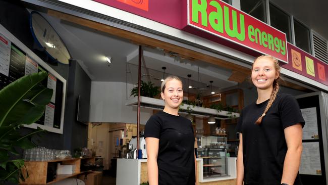 Raw Energy Coolangatta employees Lola Bennett and Tergiri Mortimer. Photo Scott Powick Newscorp