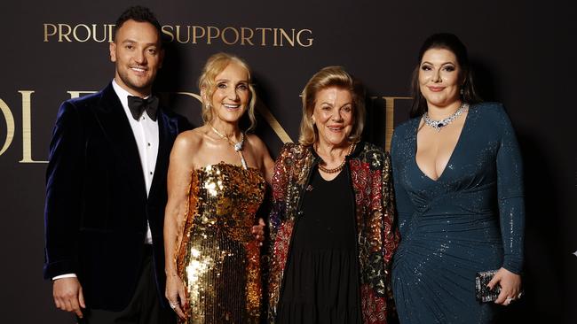 Gold Dinner co-chairs Joshua Penn and Linda Penn join the Packer ladies on the red carpet. Picture: Jonathan Ng