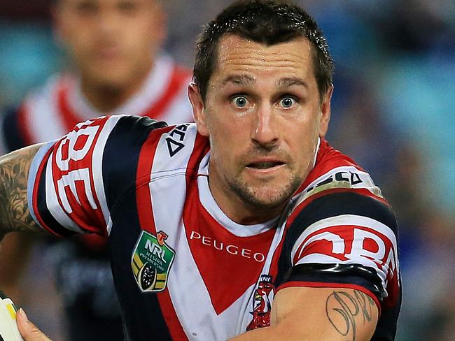 Mitchell Pearce of the Roosters on the attack during the Canterbury Bulldogs v Sydney Roosters round 10 NRL game at ANZ Stadium, Sydney Olympic Park. pic Mark Evans