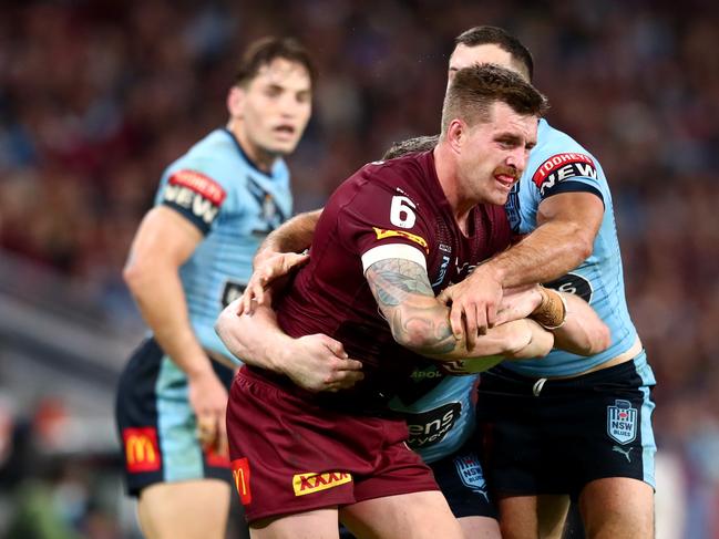 BRISBANE, AUSTRALIA - JUNE 27: Cameron Munster of the Maroons charges forward during game two of the 2021 State of Origin series between the Queensland Maroons and the New South Wales Blues at Suncorp Stadium on June 27, 2021 in Brisbane, Australia. (Photo by Chris Hyde/Getty Images)