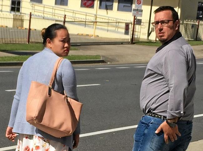 PROSTITUTION ACCUSED: Ms Chin Yi Lai, 20, and Robert Paul Dawson, 36, outside Ipswich Courthouse where they appeared on prostitution offences. Picture: Ross Irby