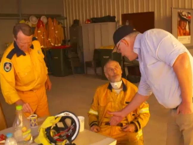 Prime Minister Scott Morrison was heckled by locals in Cobargo and an RFS firefighter refused to shake his hand.