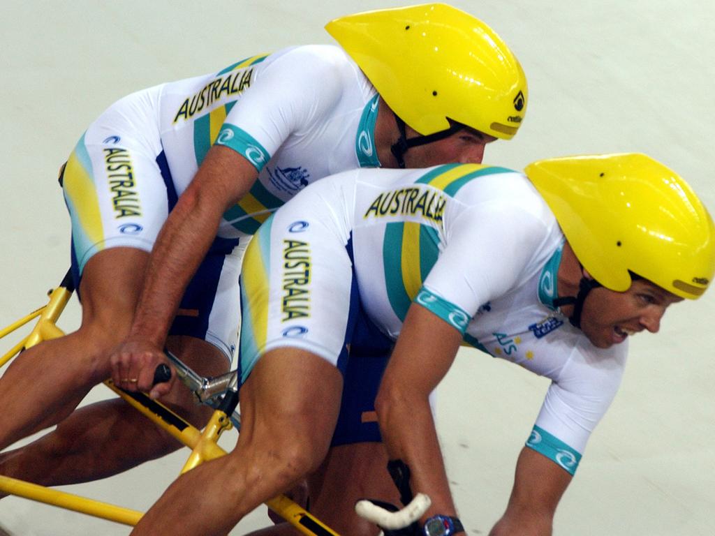 Kieran Modra and pilot Robert Crowe compete during tandem 4km individual pursuit at the Athens 2004 Paralympic Games.