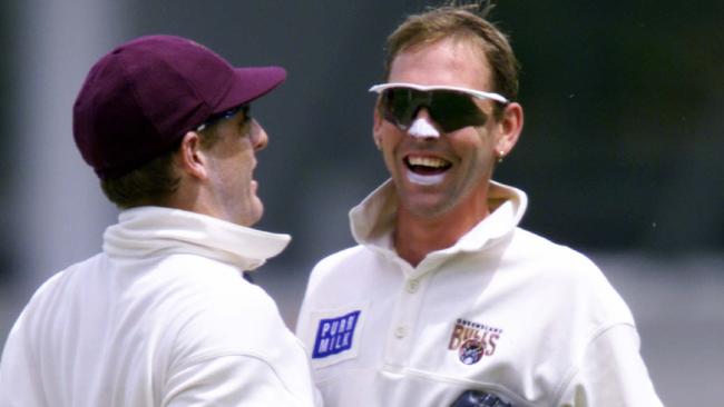 Matthew Anderson takes a wicket , congratulated by Wade Seccombe Photo - David/Kapernick.