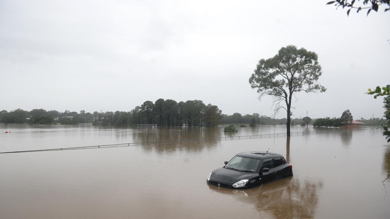 Floodwaters on Old Hawkesbury Road at McGraths Hill near Windsor. Picture: NCA NewsWire / Jeremy Piper