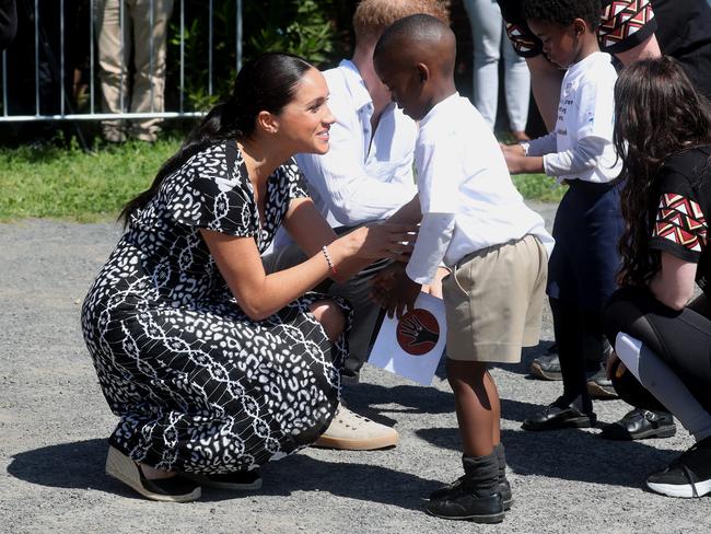 Meghan, Duchess of Sussex wore a chic maxi dress and a pair of espadrilles on the first day of her and Prince Harry’s tour of South Africa. Photo: Chris Jackson