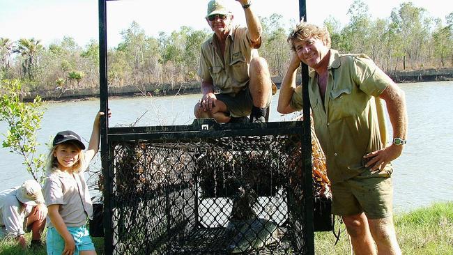 Conservationist Steve Irwin (R) on his last crocodile hunt, with his daughter Bindi Irwin (L) and father Bob Irwin (C).