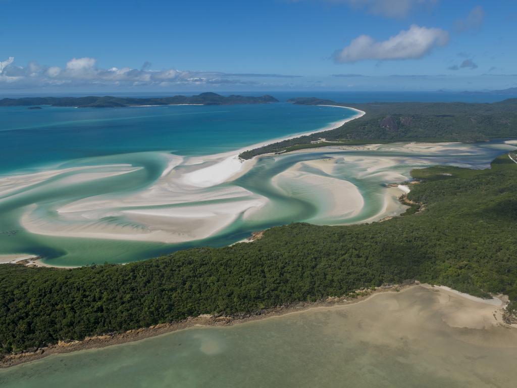 An aerial view of Tongue Point, Apostle Bay, Whitsunday Island, Hill Inlet and Haslewood Island, in the Whitsunday region. Picture: Supplied