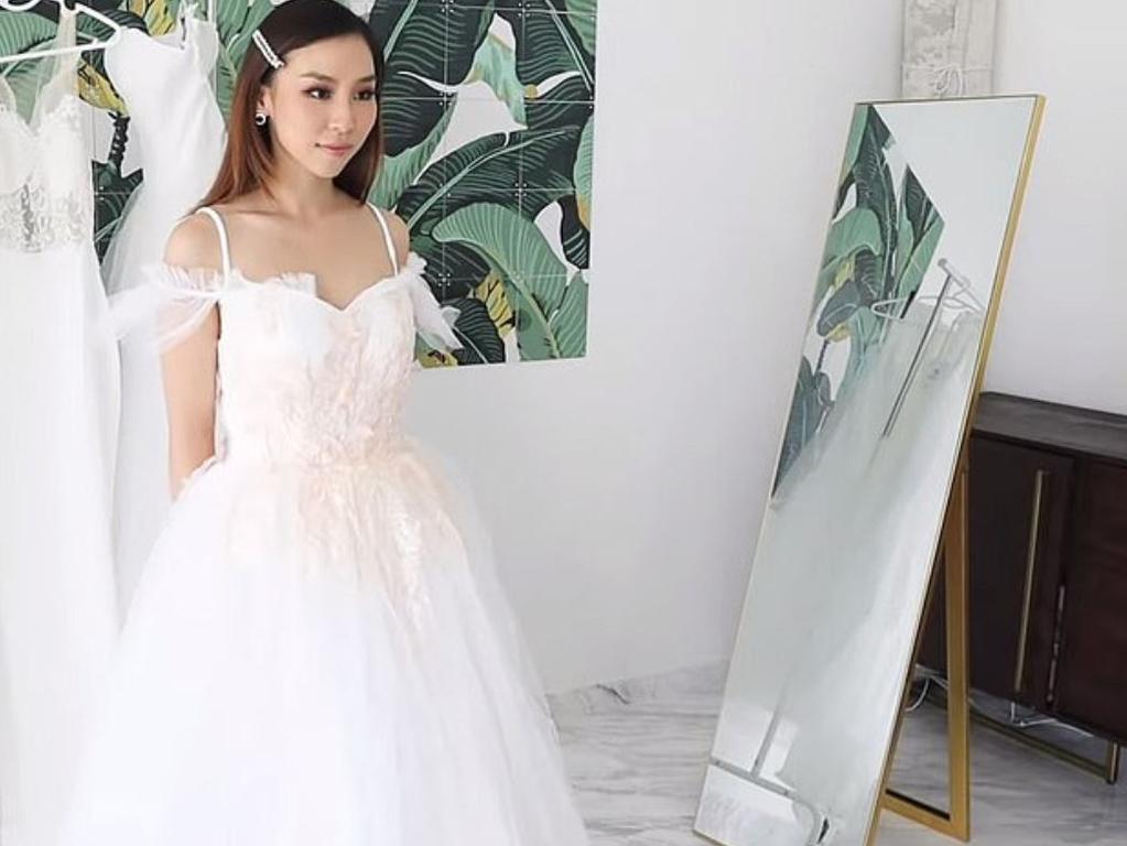 Cheap wedding dresses YouTube star tries on 21 X rated gowns