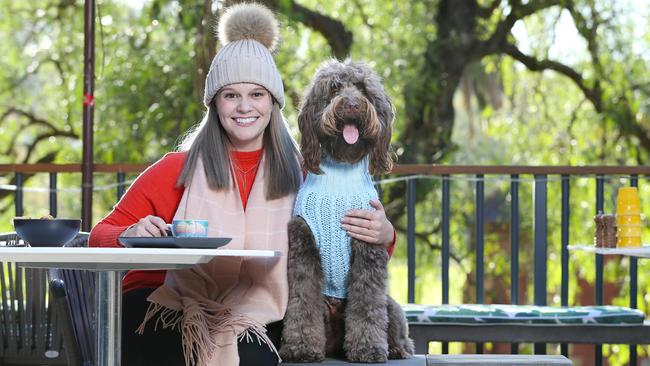 Amelia Perry has Otis decked out in a DOGUE winter coat at Storehouse on the Park @ Vibe Rushcutters Bay. Picture: Rohan Kelly