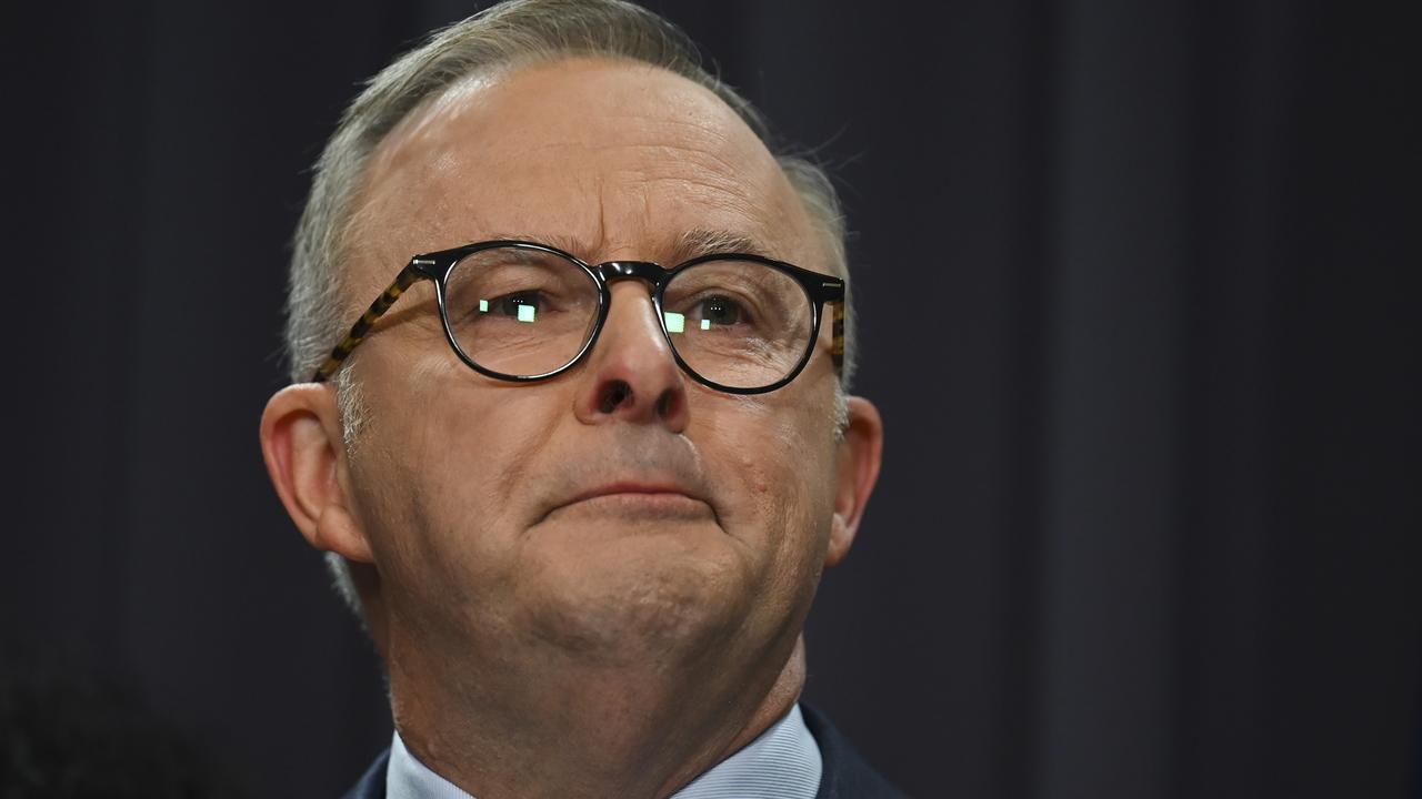 Mr Albanese released the wording standing beside the government’s referendum working group. Picture: NCA NewsWire / Martin Ollman