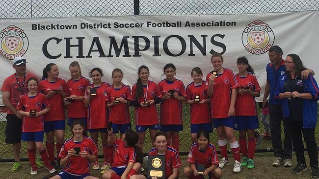 Prospect United U/12 Division 2 Girls Soccer Team celebrate their grand final win.