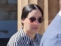 Ghizlane Jabrane (female) with her lawyer outside the Adelaide Magistrates Court where she is charged with corruption offending. Picture: Sean Fewster