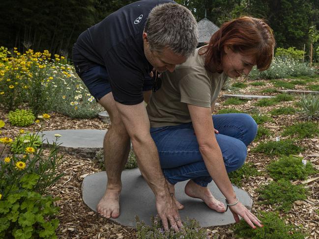 MELBOURNE, AUSTRALIA - NCA NewsWire Photos December 17, 2020:   Megan and Joel OÃBrien walk barefoot through the new Sensory Garden at the Botanic Gardens in Melbourne, Victoria. Picture: NCA NewsWire / Daniel Pockett