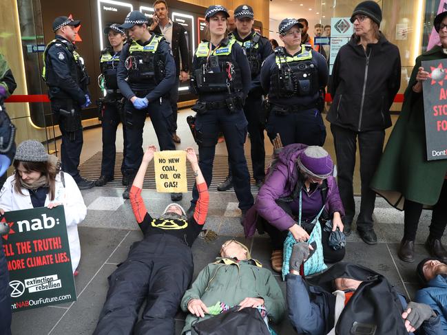 MELBOURNE, AUSTRALIA - NewsWire Photos, MAY 25, 2023. Climate protesters are holding three days of protest in Melbourne. Pictured in front of NAB headquarters in Bourke street where police moved some protester out of the entrance. . Picture: NCA NewsWire / David Crosling