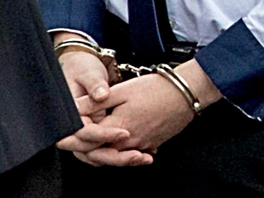 *FILE PIX* NCA NewsWire Photos: Editorial generic stock photo of person in handcuffs. Picture: NCA NewsWire