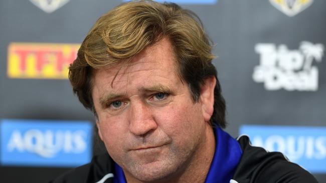 Bulldogs coach Des Hasler looks on during a press conference.