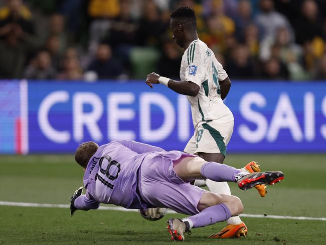 Socceroos goalkeeper Joe Gauci makes a crucial save. Picture: Getty Images