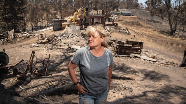 Ms Nitschke, pictured two weeks on from the fire in 2019. She now has the foundations for her new home on the same site. Picture: Brad Fleet