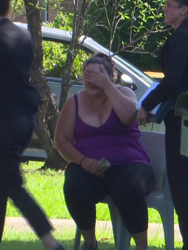 A distraught woman outside the home. Picture: TNV