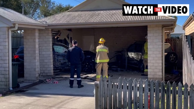 Stolen BMW crashes into Brisbane house