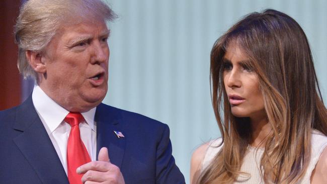 Donald Trump and his wife Melania on stage after the Republican presidential debate.