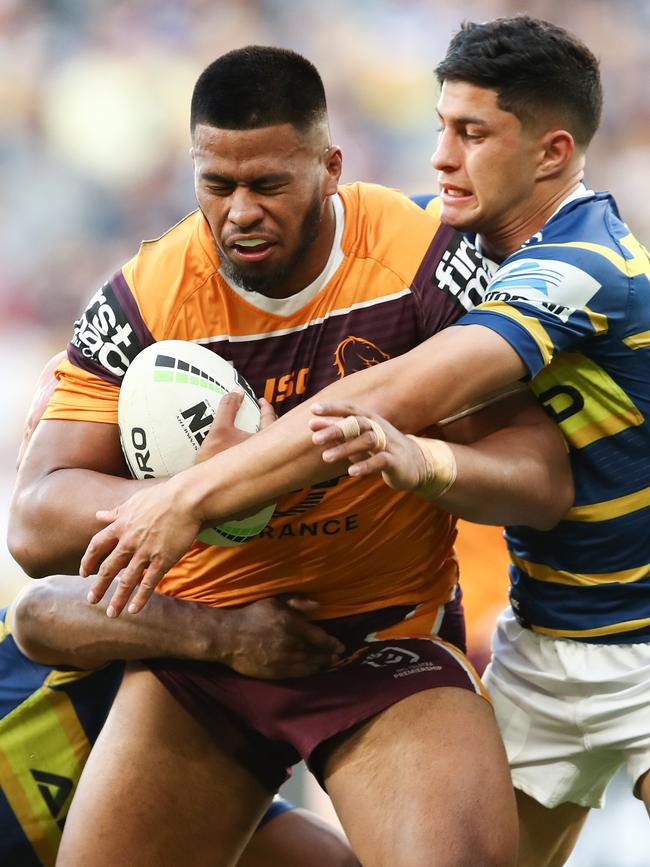 Payne Haas on a rare burst for the Broncos last night. Picture: Brendon Thorne/AAP