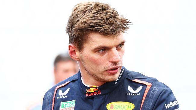 MONZA, ITALY - SEPTEMBER 01: Sixth place Max Verstappen of the Netherlands and Oracle Red Bull Racing and eighth place Sergio Perez of Mexico and Oracle Red Bull Racing, look on in parc ferme during the F1 Grand Prix of Italy at Autodromo Nazionale Monza on September 01, 2024 in Monza, Italy. (Photo by Mark Thompson/Getty Images)