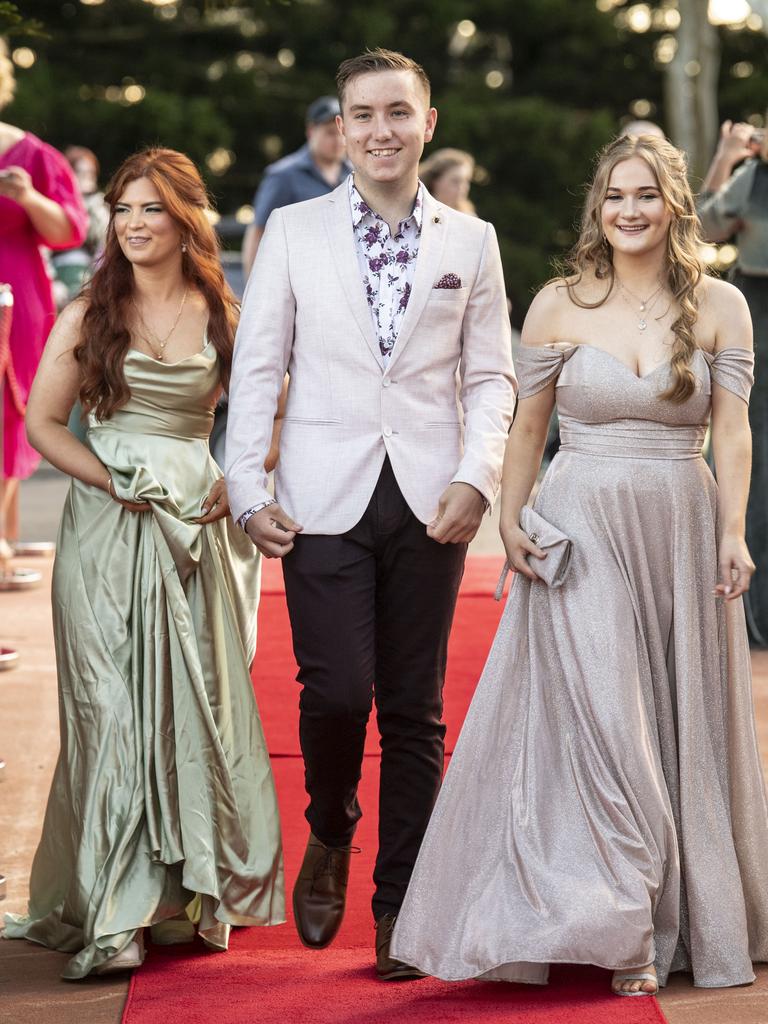 Arwen Elder, Wyatt Myers and Tara Abbott. Toowoomba State High School formal at Picnic Point. Friday, September 9, 2022. Picture: Nev Madsen.