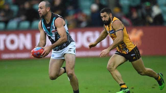 Matthew Broadbent on the burst ahead of Paul Puopolo in Round 10. Picture: AAP Image/Julian Smith